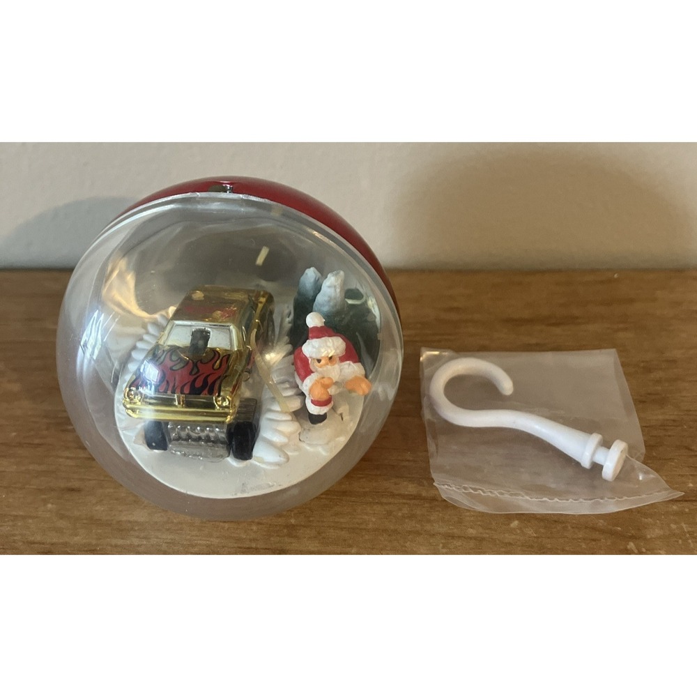 1999 Hot Wheels Planet Micro RED CHRISTMAS SANTA ORNAMENT with Hanger